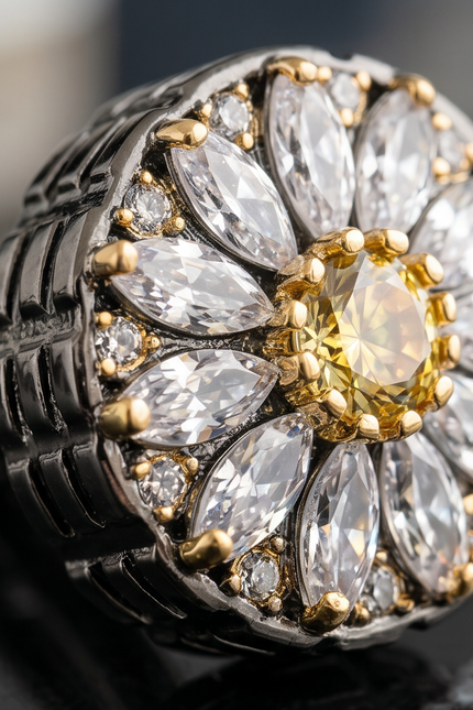 Close-up of a decorative brooch with marquise-shaped stones and gold accents.