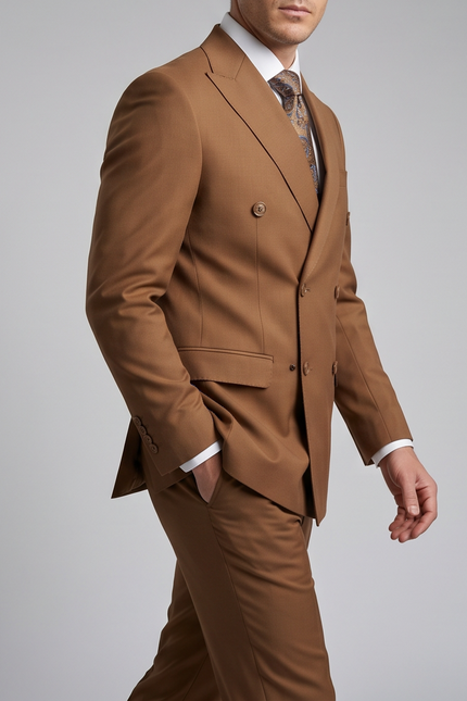 Brown suit worn by a person on a gray background