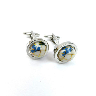 Cream Globe cufflinks by PAMONI featuring a round globe design with a smooth cream finish and metal backing.