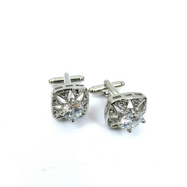 Silver hollow crystal cufflinks by PAMONI featuring sleek design and sparkling crystal accents for elegant men's accessories