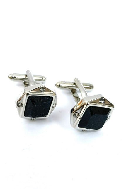 Black glitter gemstone cufflinks by PAMONI featuring polished metal and sparkling gemstone accents for formal attire.