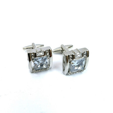 Silver square gemstone cufflinks by PAMONI featuring polished silver with square-cut gemstones for a sophisticated look.