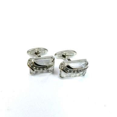 Silver Wing Design rectangular cufflinks by PAMONI, featuring a sleek rectangular shape with wing detailing, on a neutral background.