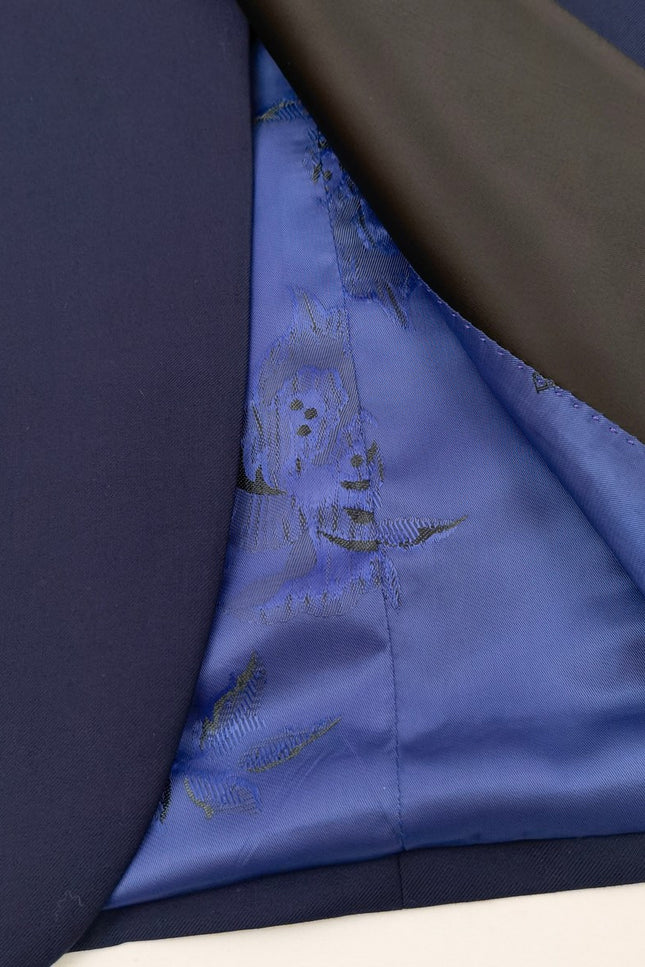 Smoking trois pièces bleu marine à revers pointus noirs