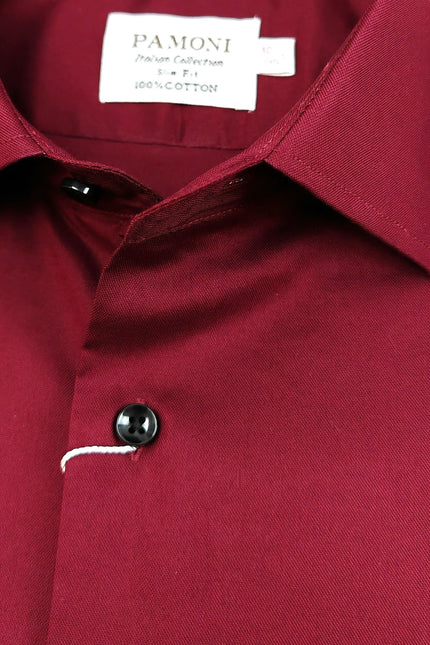Close-up of a red shirt with a visible brand label.