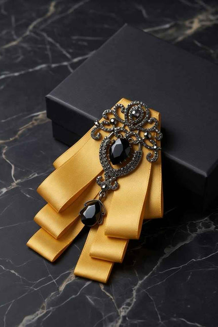Ornate Gold Ribbon Bow with Black Crystal Embellishment